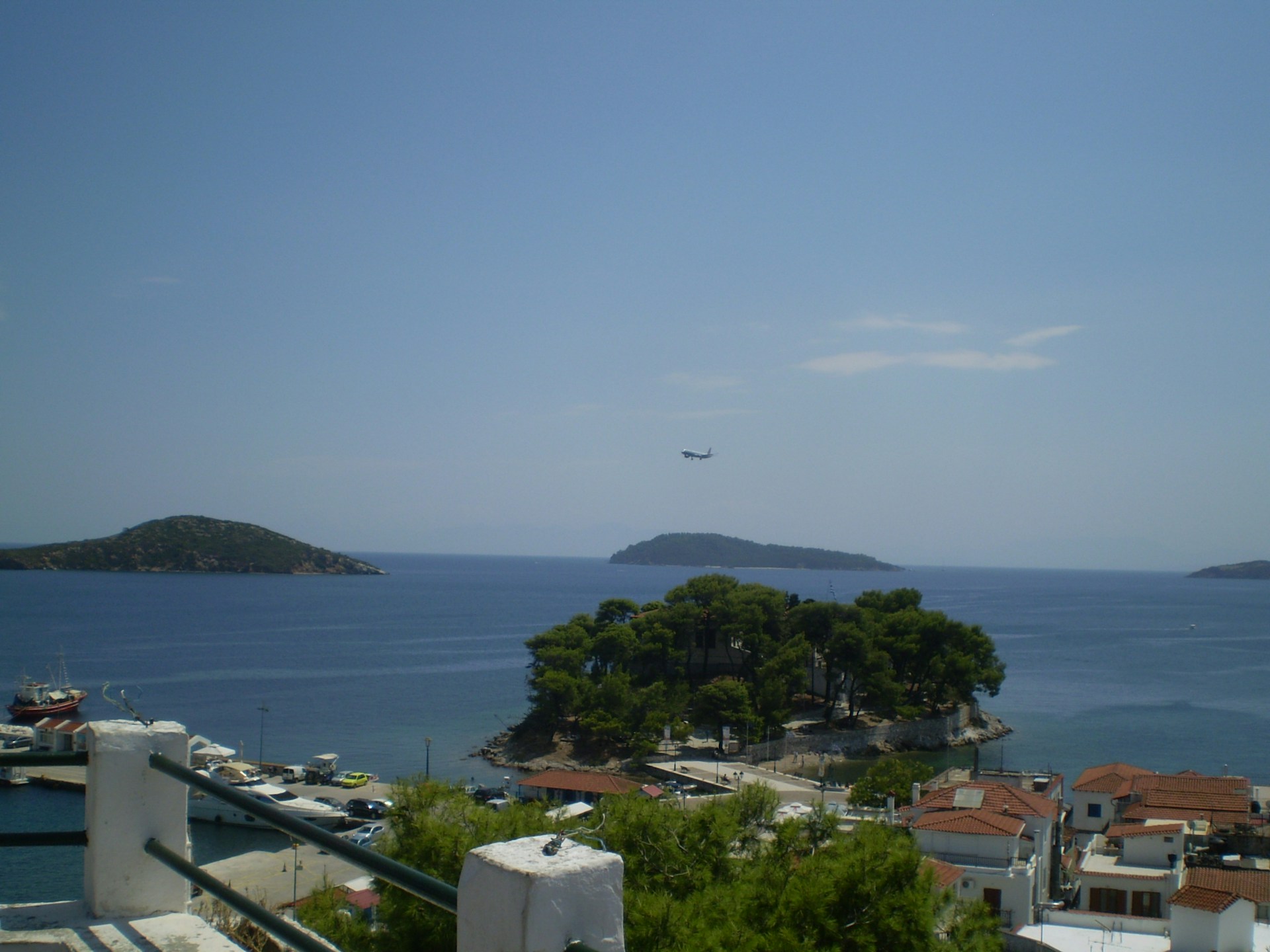 woman wearing yellow long-sleeved dress under white clouds and blue sky during daytime