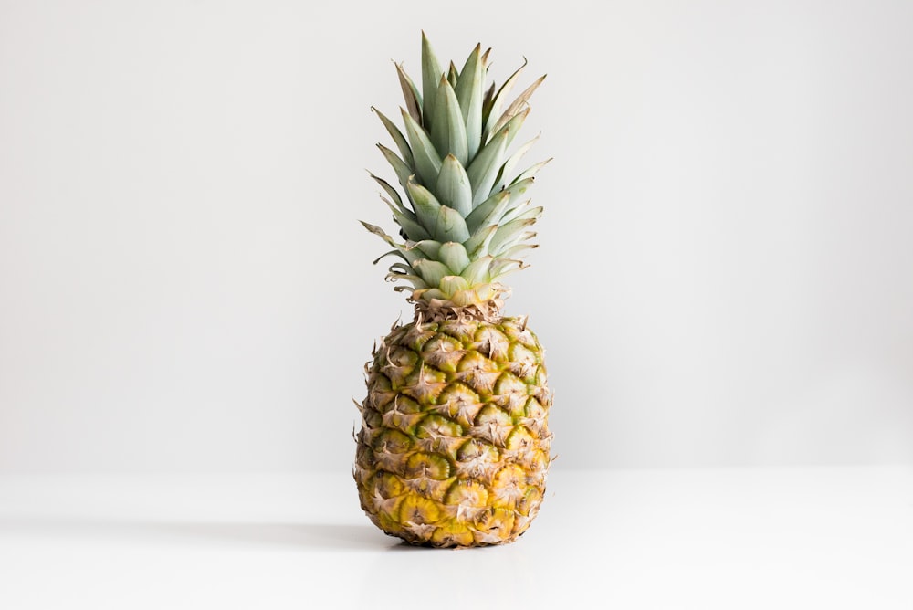 pineapple on white surface