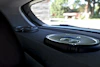 Close-up of a car audio system being installed with precision and care.