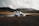 white car crossing body of water