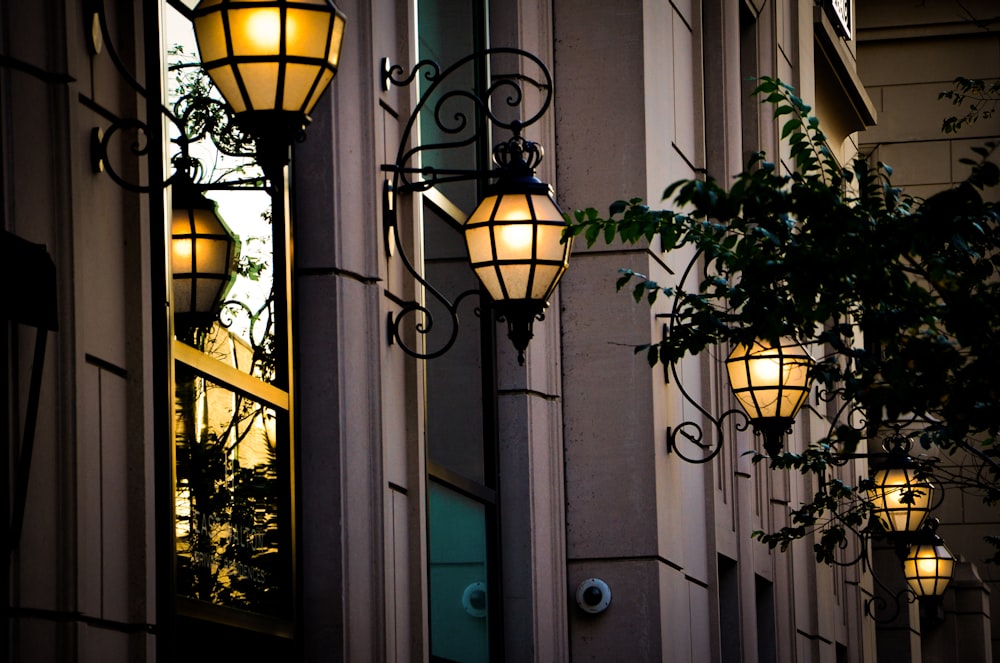 a couple of lights that are on the side of a building