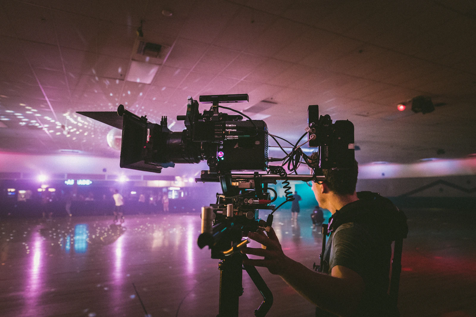 Documentary camera operator filming on location