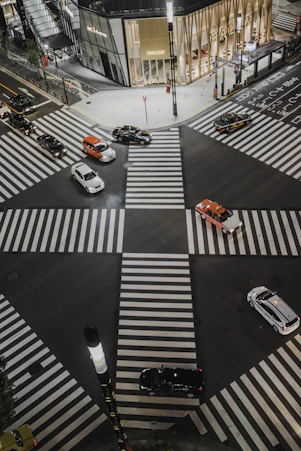 aerial view photo of vehicles crossing road