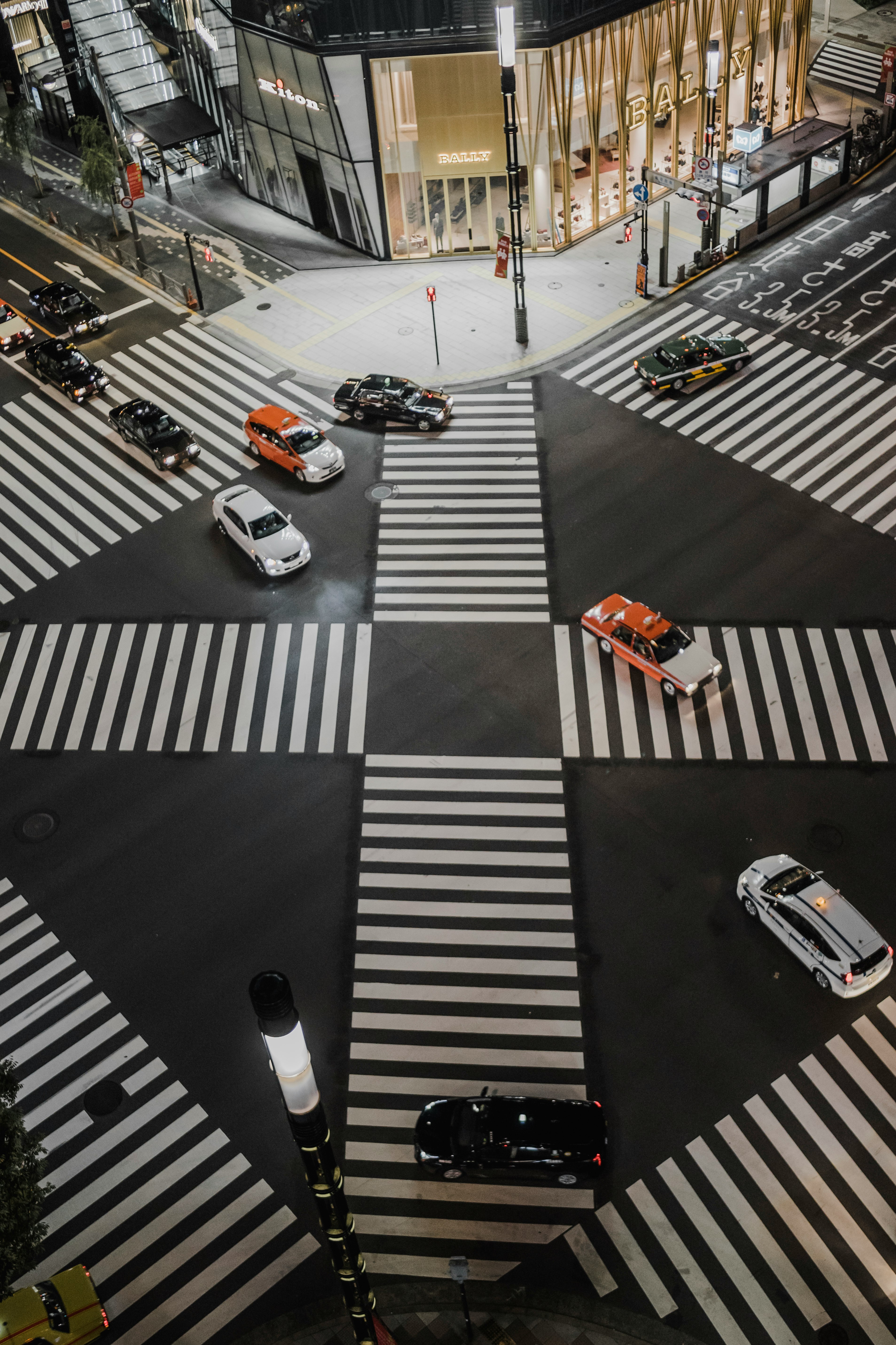 aerial view photo of vehicles crossing road