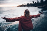 person standing near body of water
