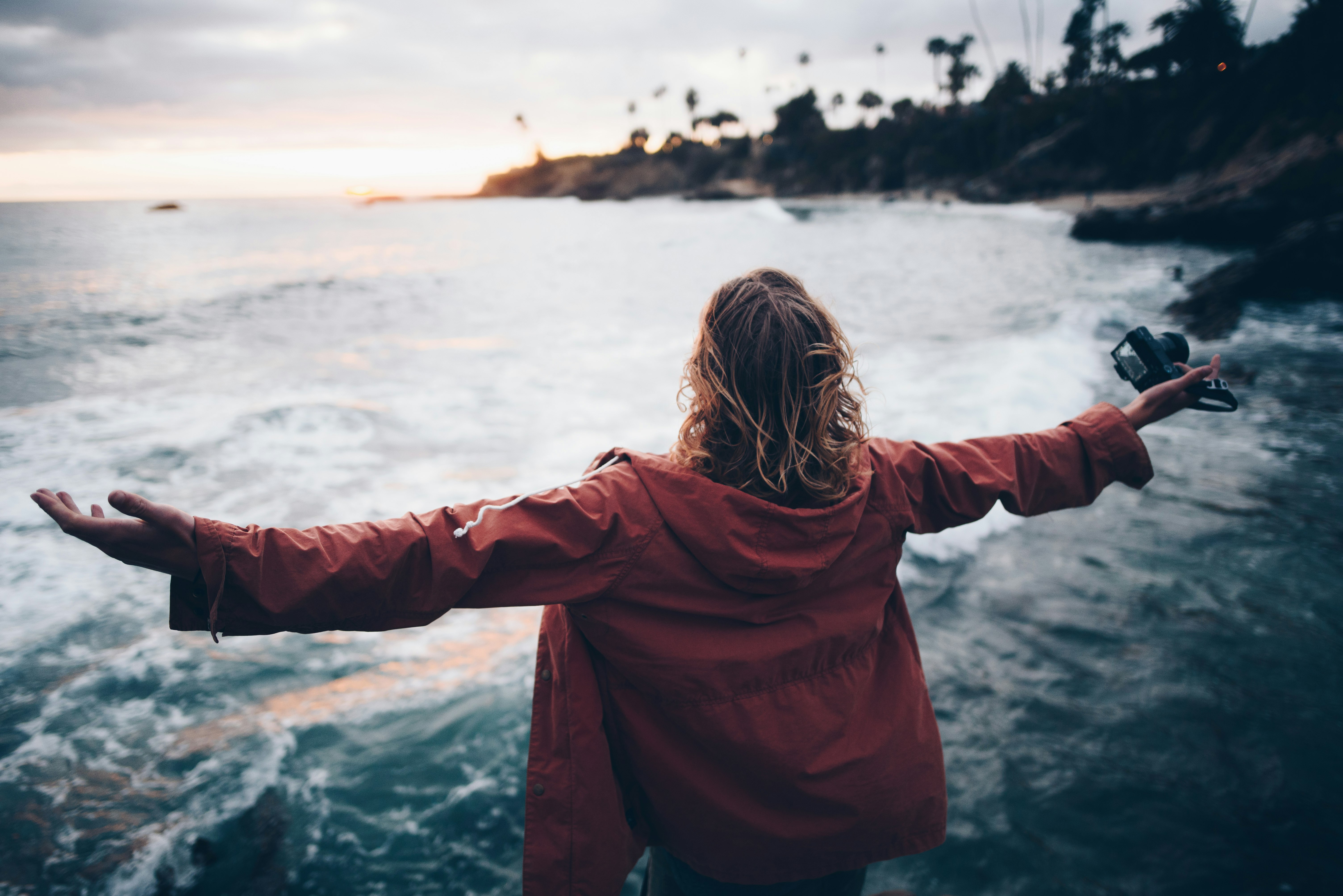 person standing near body of water