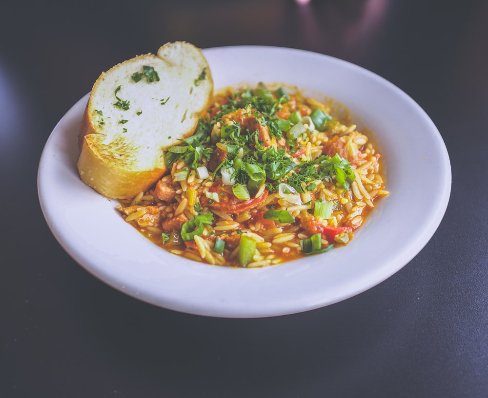 sliced bread and pasta with vegetables