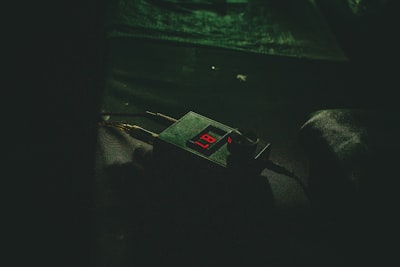 black digital device with the number 87