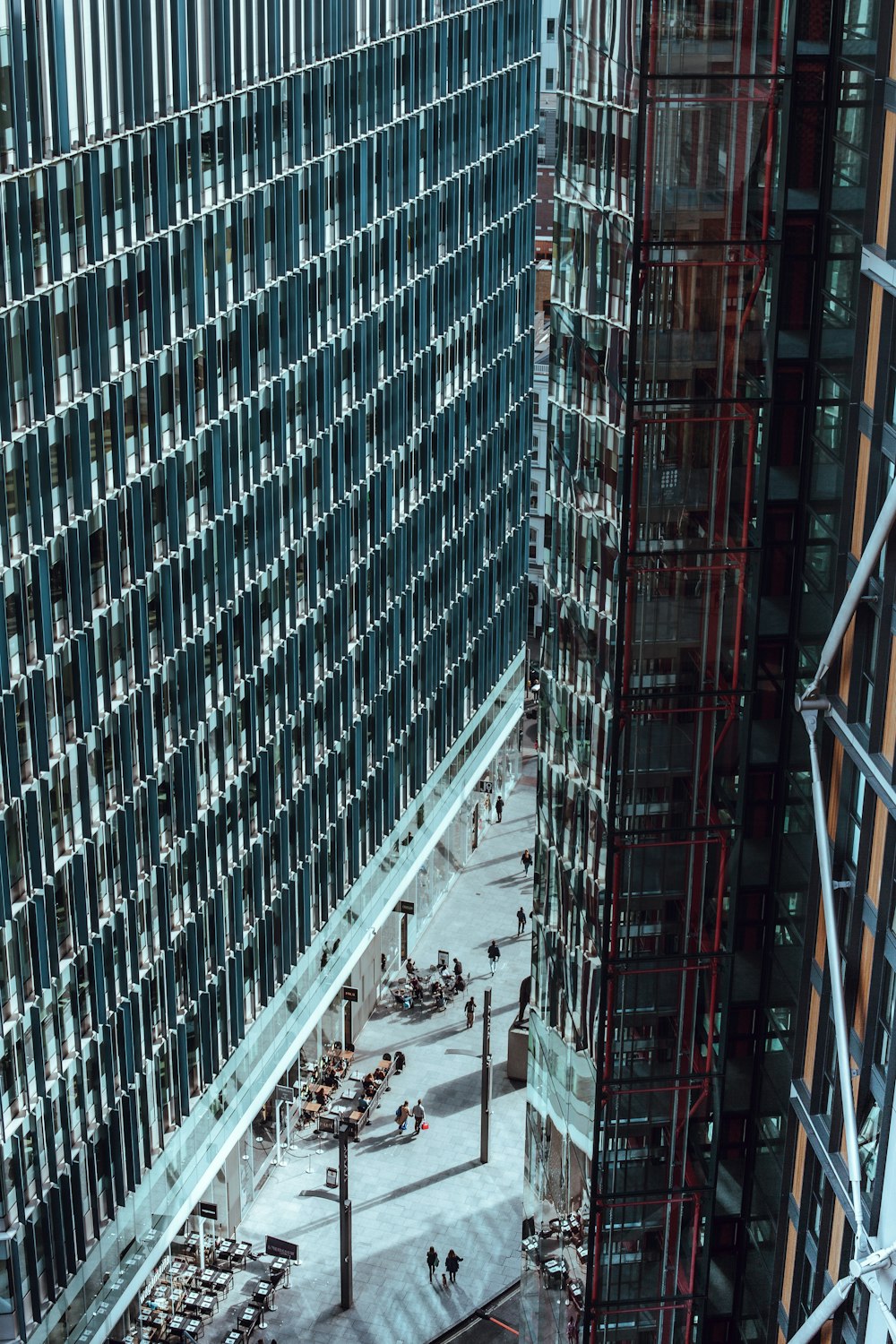 aerial photography of high-rise building beside road during daytime