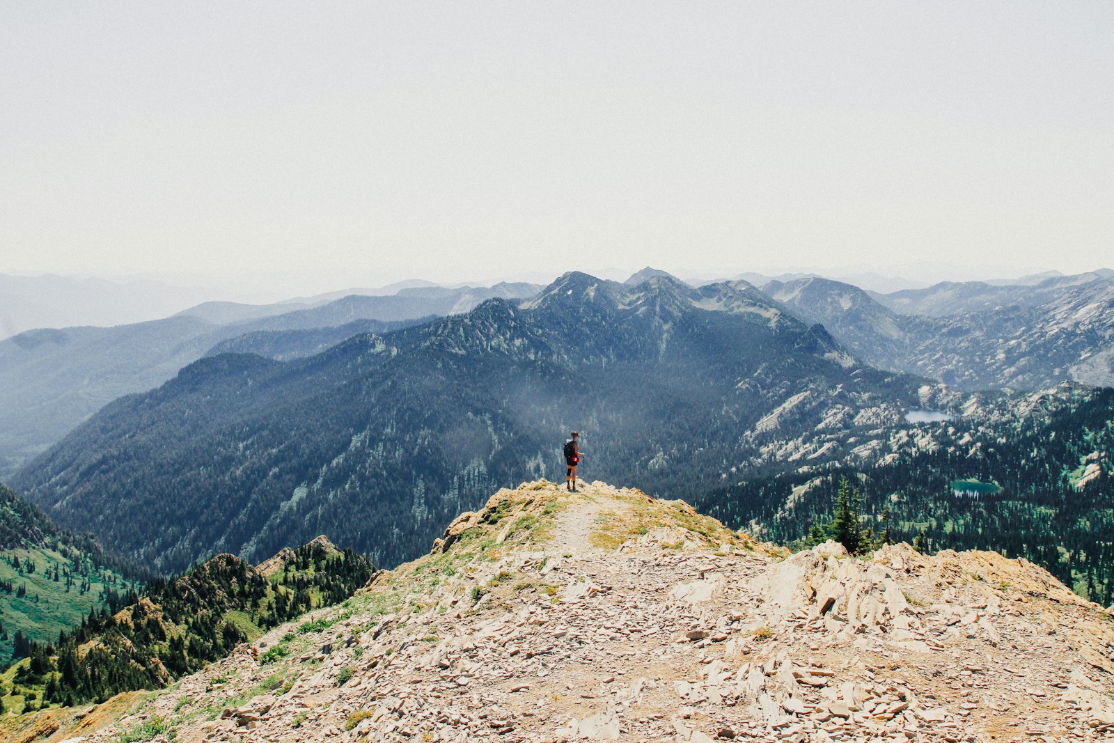 Canon EOS 7D + Canon EF-S 17-55mm F2.8 IS USM sample photo. Person standing on mountain photography