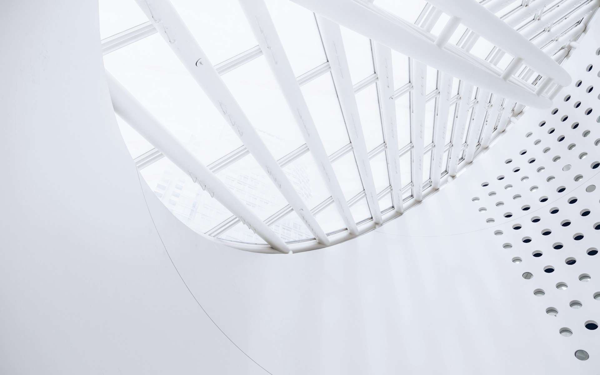 white spiral staircase with white railings