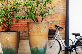 A calendar marked with bike service appointments next to a shiny, well-maintained bicycle.