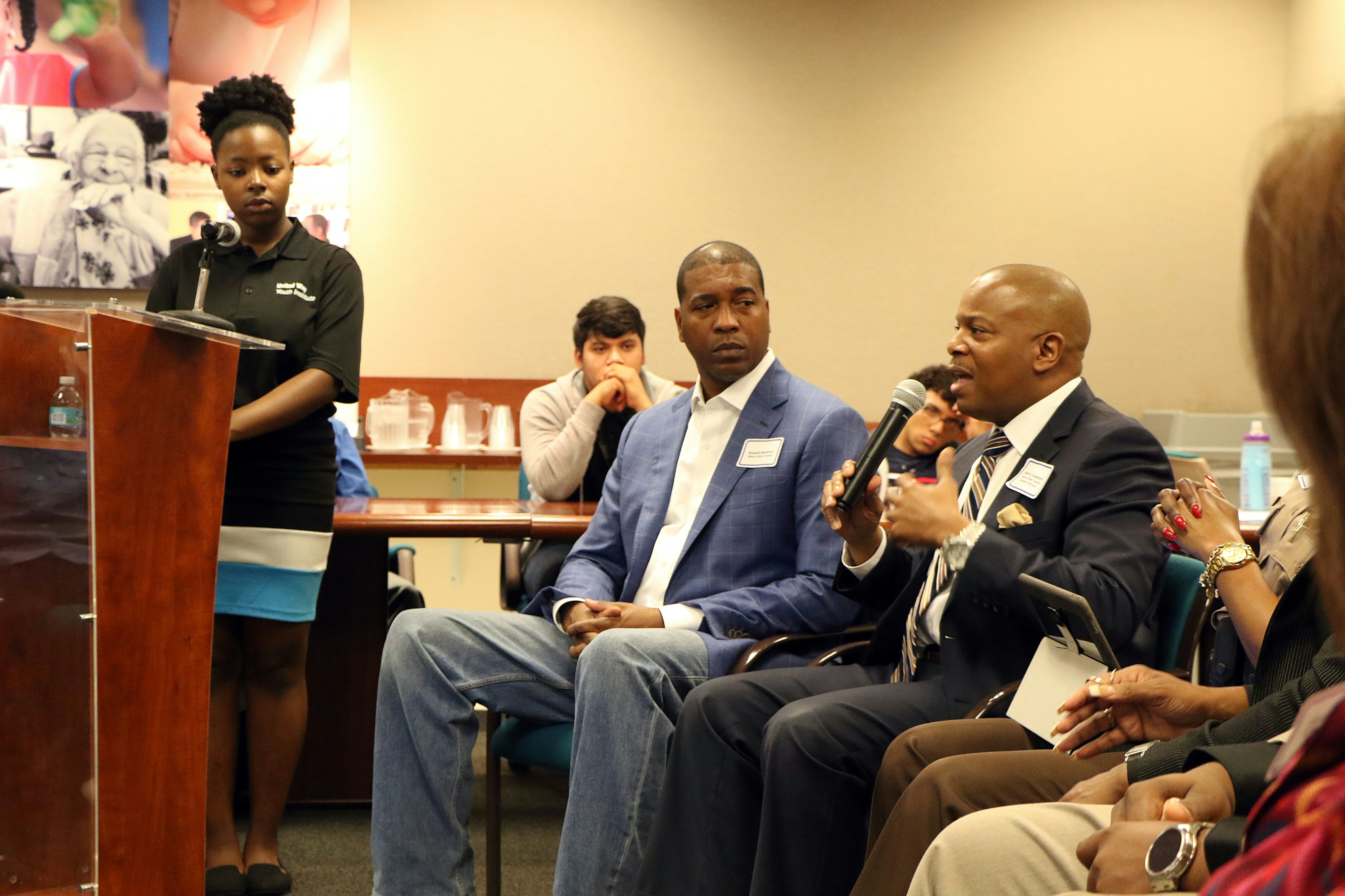 Professional woman sharing testimonial about IATHAM advisory services impact