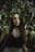 lowlight photography of woman in black crop top near plants