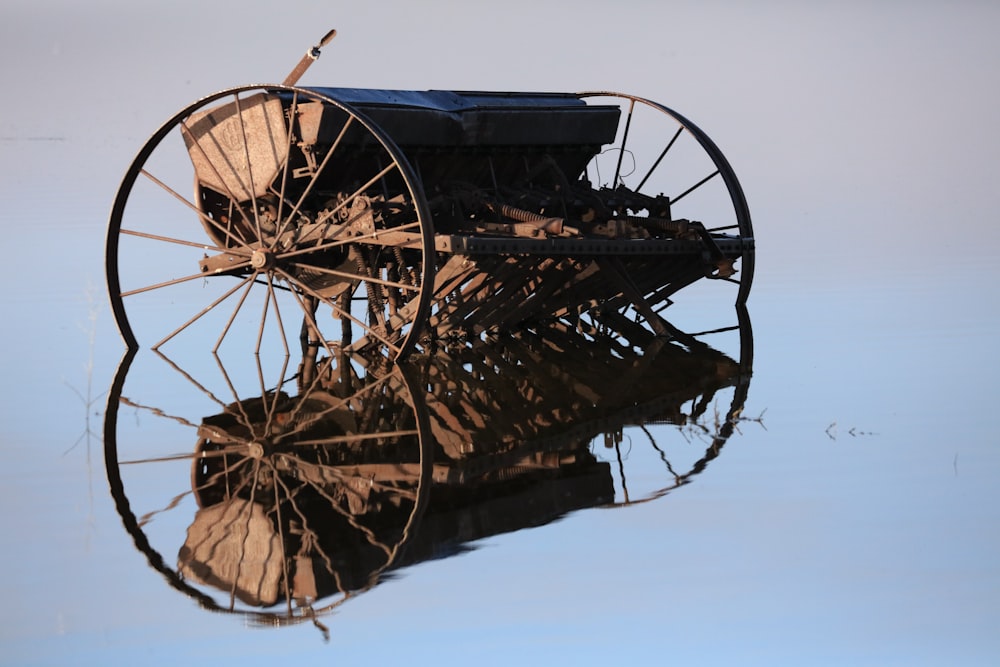 brown wooden windmill under white sky during daytime