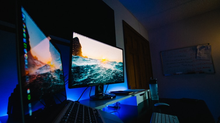 A serene workspace bathed in soft ocean blue light with a keyboard inviting gentle, mindful typing.