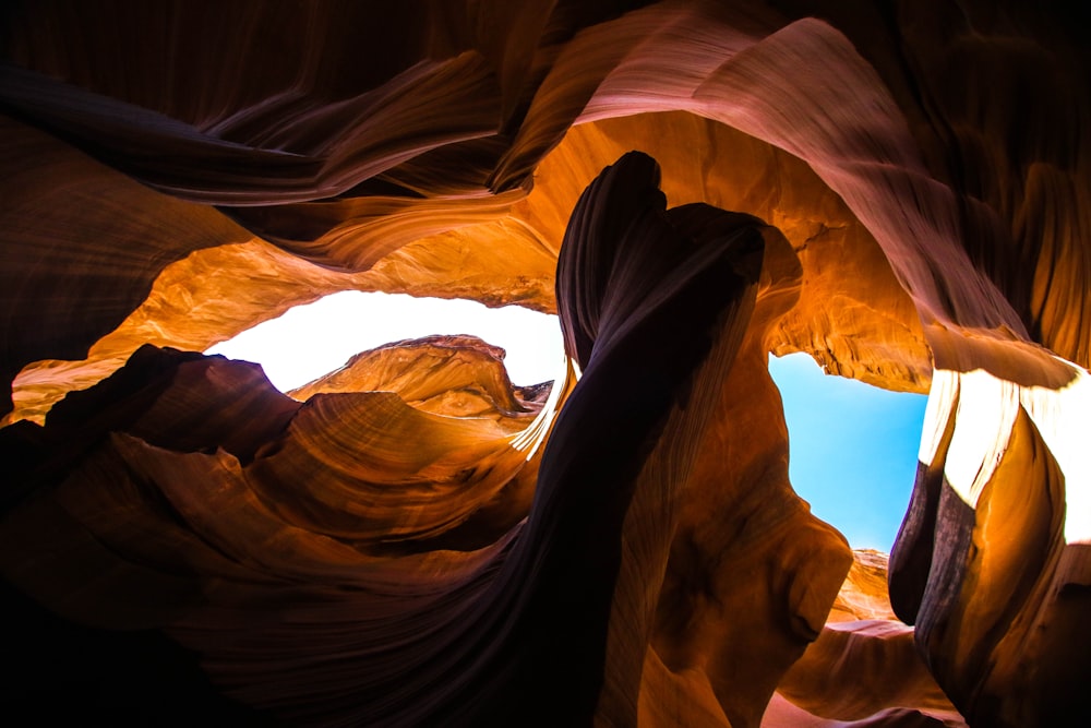 low-angle photo of cave