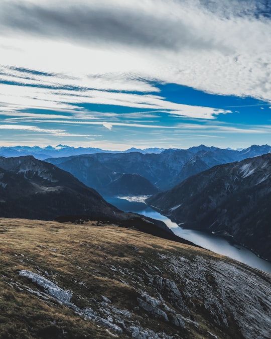 green and brown mountains under blue sky during daytime in Hochunnutz Austria