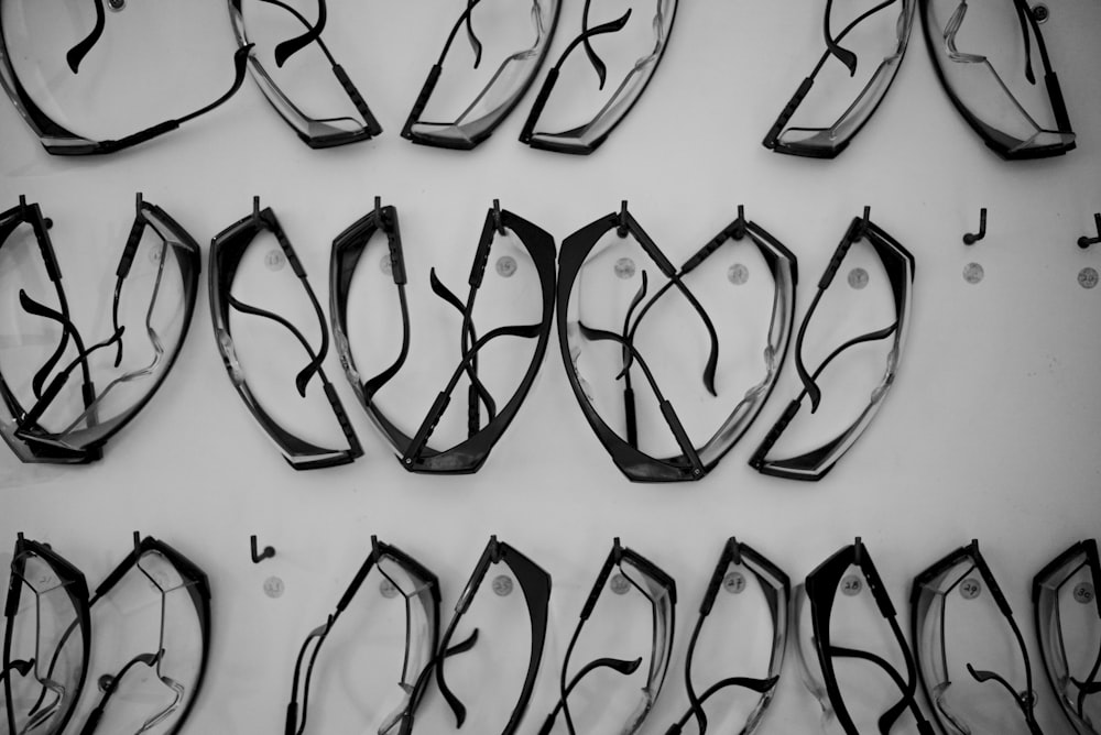 a group of glasses sitting on top of a wall