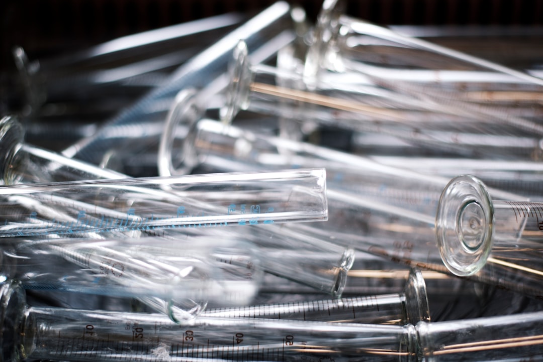 pile of clear measuring test tubes