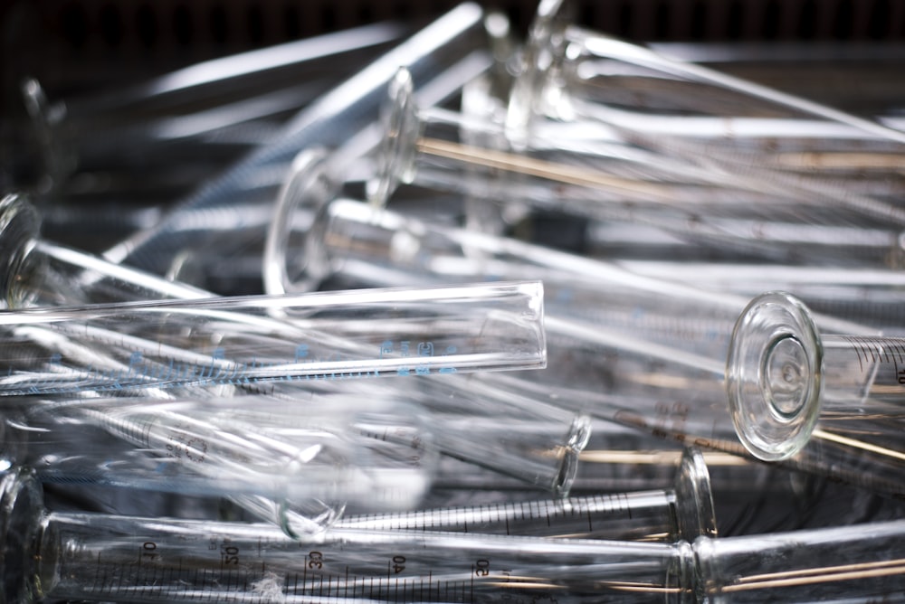 pile of clear measuring test tubes
