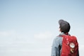 man staring at white sky taken at daytime