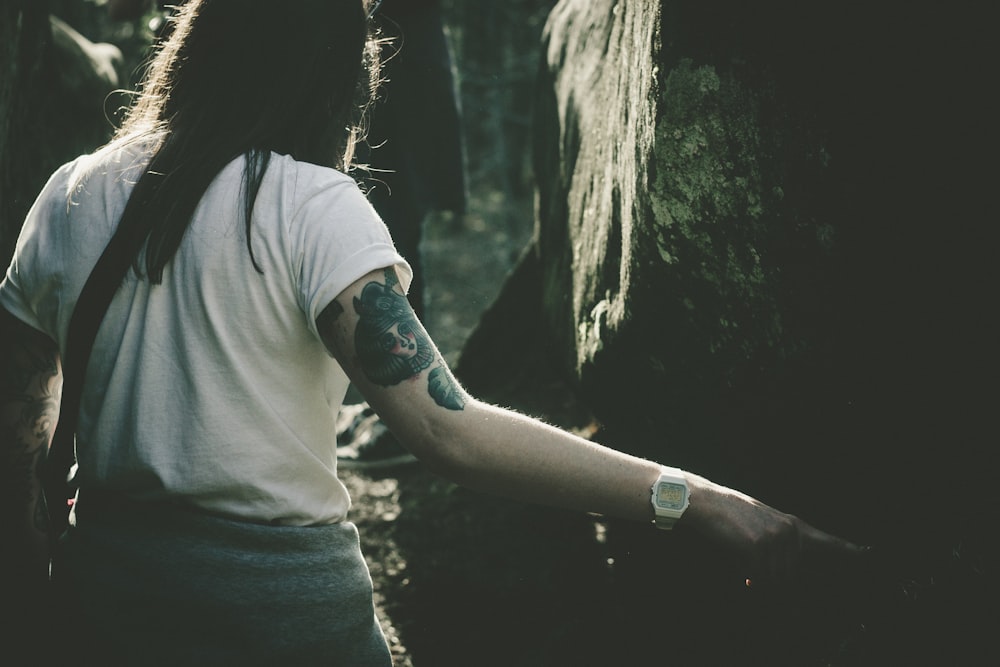 woman standing in front of tree