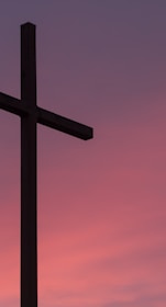 brown wooden cross during golden hour