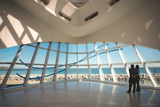 Ground floor layout featuring large windows and sea views.