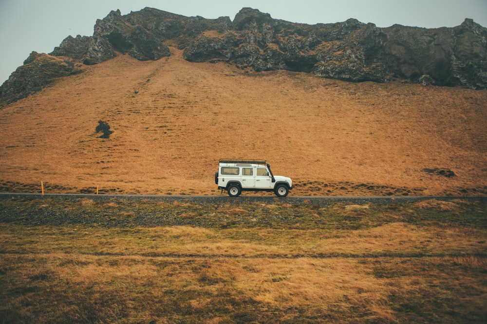 SUV travelling in a deserted place