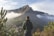 man standing in front of mountain