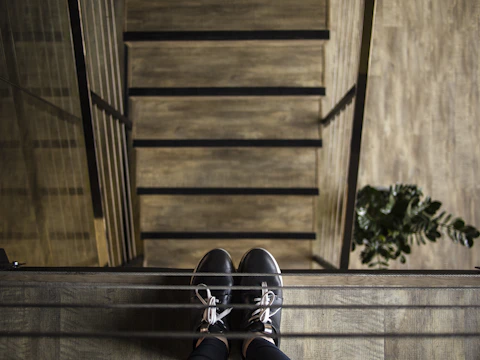 A side view of easystep attached securely to a staircase.