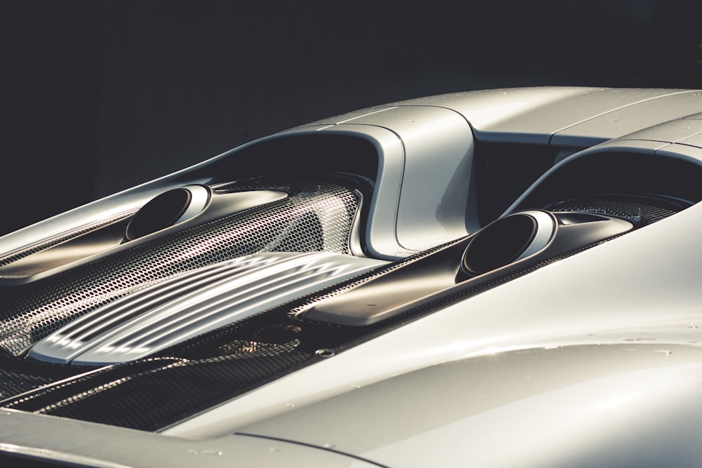 Rear view of a silver Porsche 918.