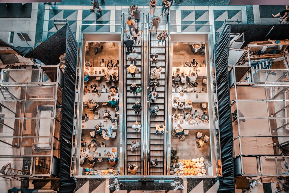 birds eye photography of people walking in stair