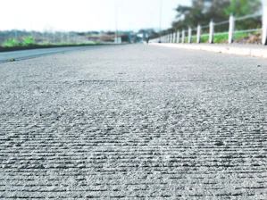 Wide shot of a large HGV road with freshly poured and brushed concrete surface.
