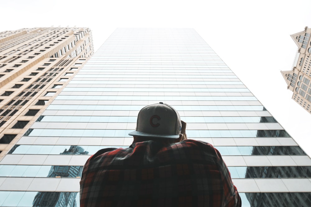 person near tall building during daytime