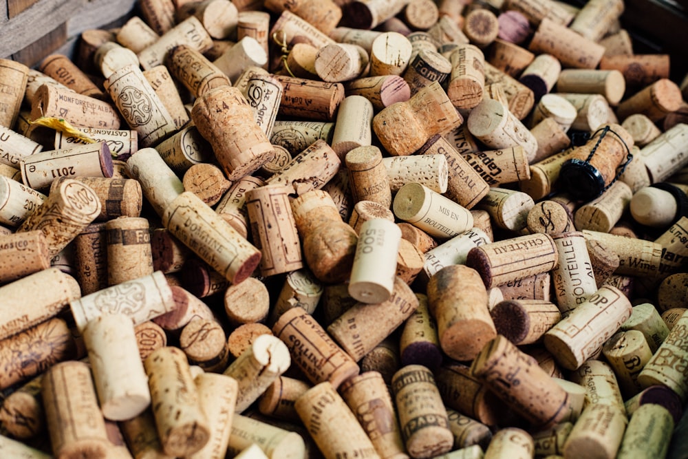 pile of brown cork lids| Rare Wine Festival