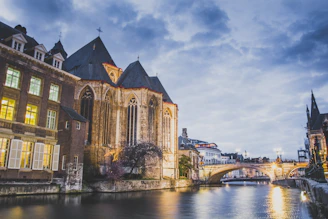 A warm, inviting photo of the Goulburn Revival Fellowship church building at 34 River Street, bathed in soft morning light.