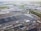 Aerial view of a large industrial park with data centers and manufacturing facilities.