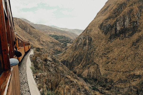 A majestic view of the Copper Canyon with a train winding through the rugged landscape