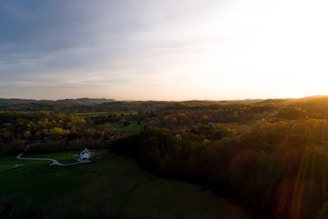 A picturesque view of a property surrounded by scenic landscapes.
