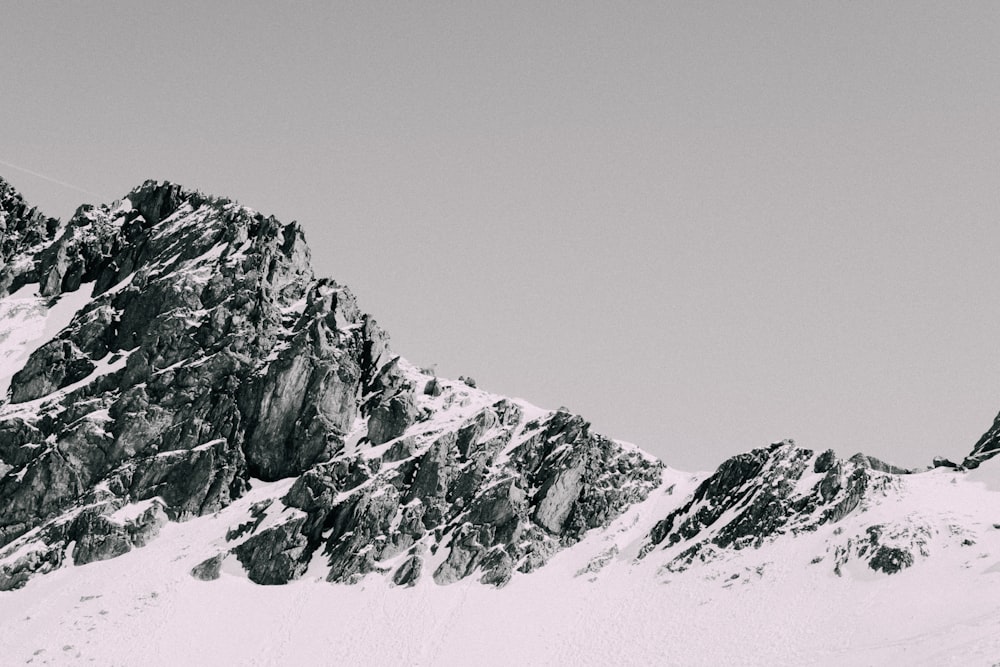 snow covered mountain during daytime