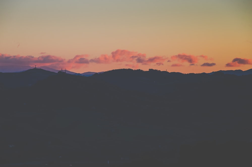 silhouette photography of highlands