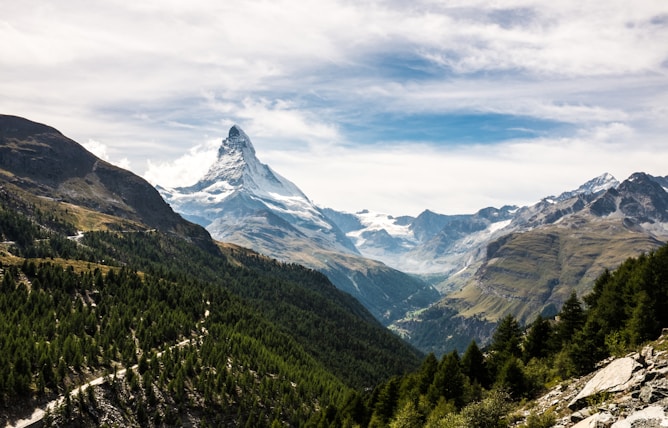 Snow covered Matterhorn mountain with trees Switzerland