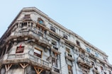 concrete building with balconies during day