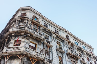 concrete building with balconies during day