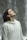 man in gray pullover hoodie closed eyes while heads up