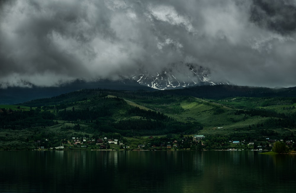 landscape photography of city and black sky