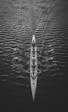 people riding boat on body of water