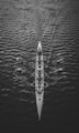 people riding boat on body of water